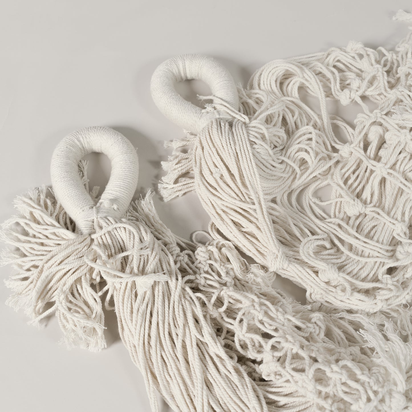 Rankų darbo pintas hamakas